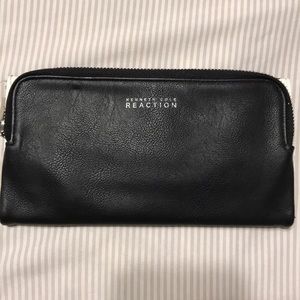 Kenneth Cole tri fold wallet.